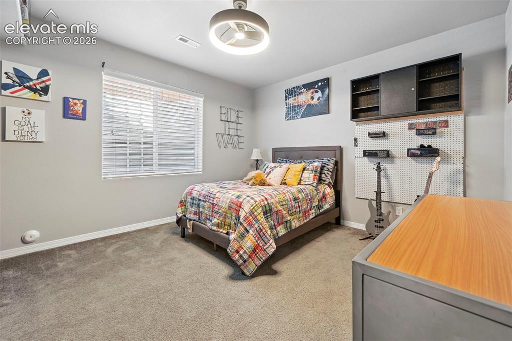 Image 36 of 50: Basement bedroom