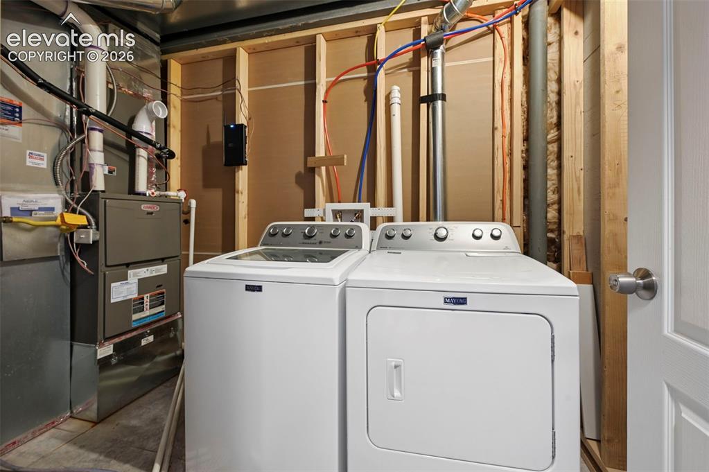 Image 42 of 50: Additional / secondary laundry room in basement!  