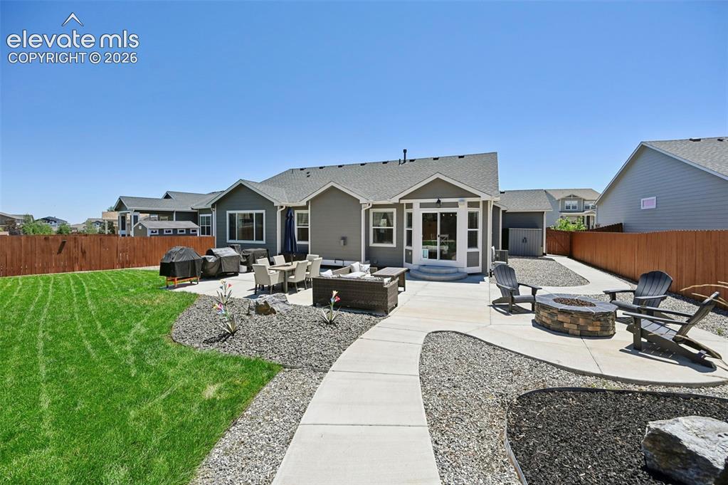 Image 43 of 50: Designer professionally landscaped yard w/ walkway to solar shed, extended 