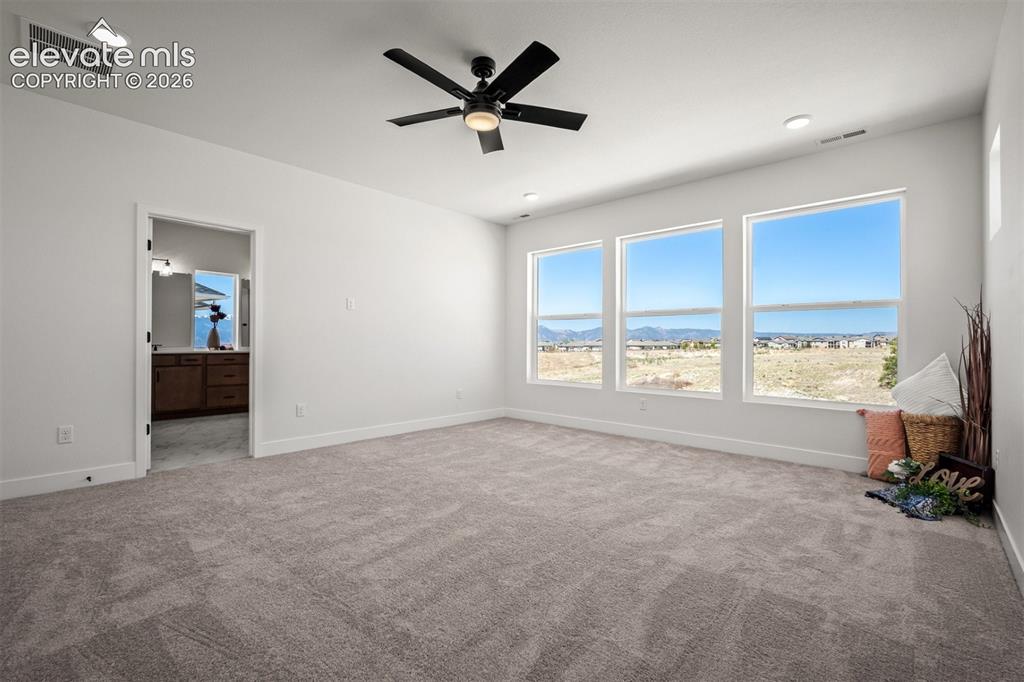 Image 20 of 38: Master Bedroom