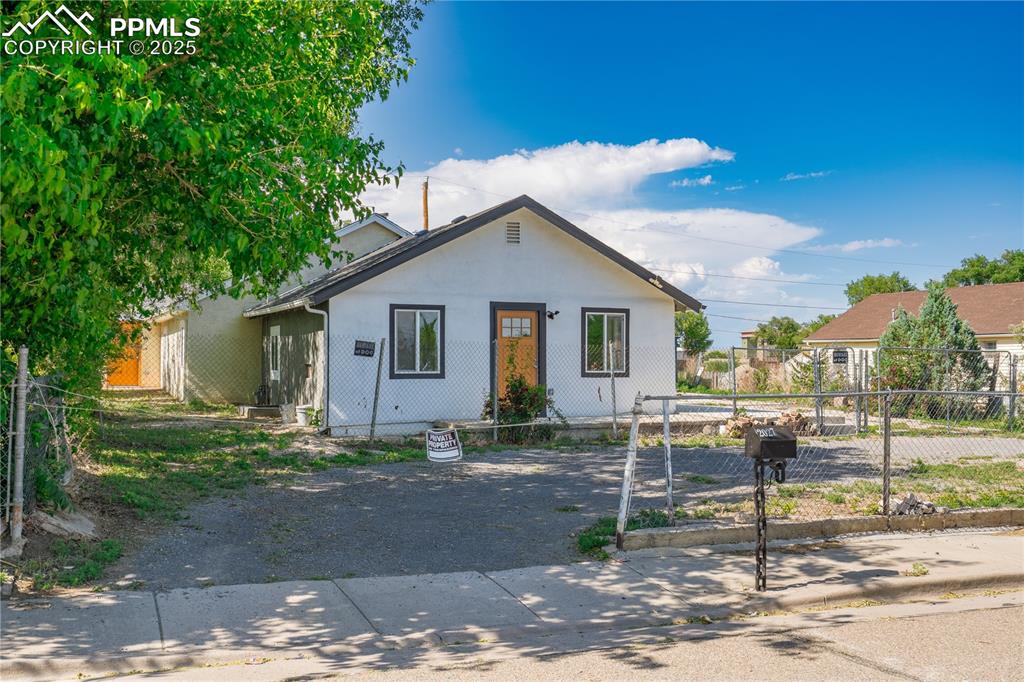 Image 35 of 35: View of bungalow-style home
