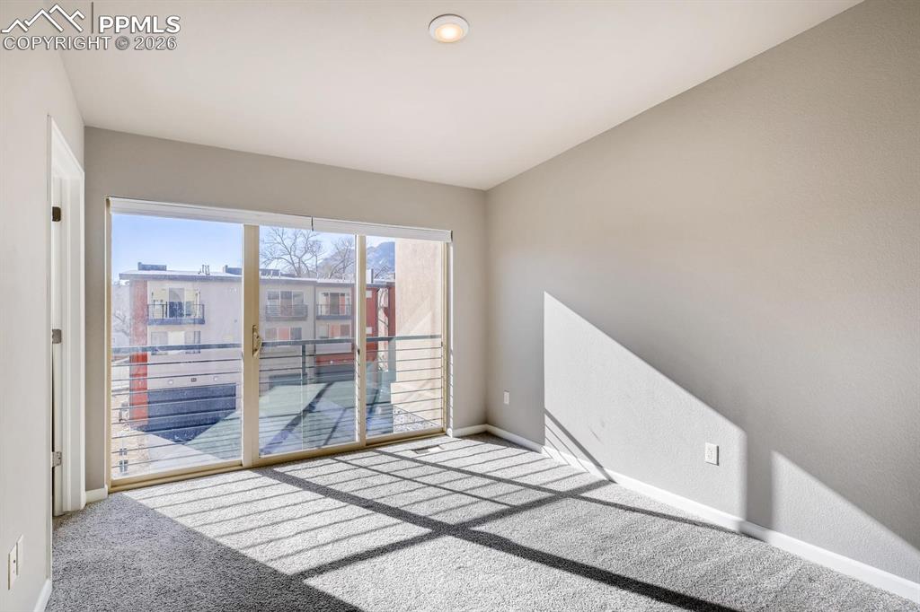 Image 18 of 29: Upstairs bedroom with en-suite bath