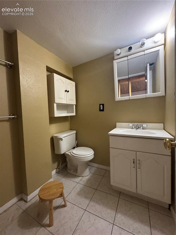 Image 17 of 23: Basement Bath attached to large bedroom