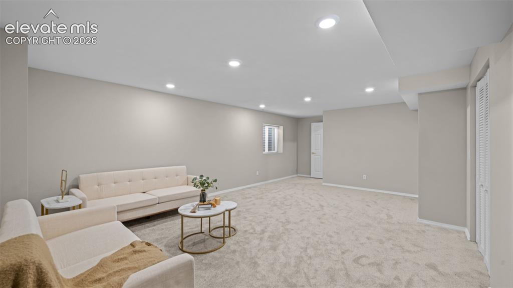 Image 30 of 48: Huge family or rec room in basement