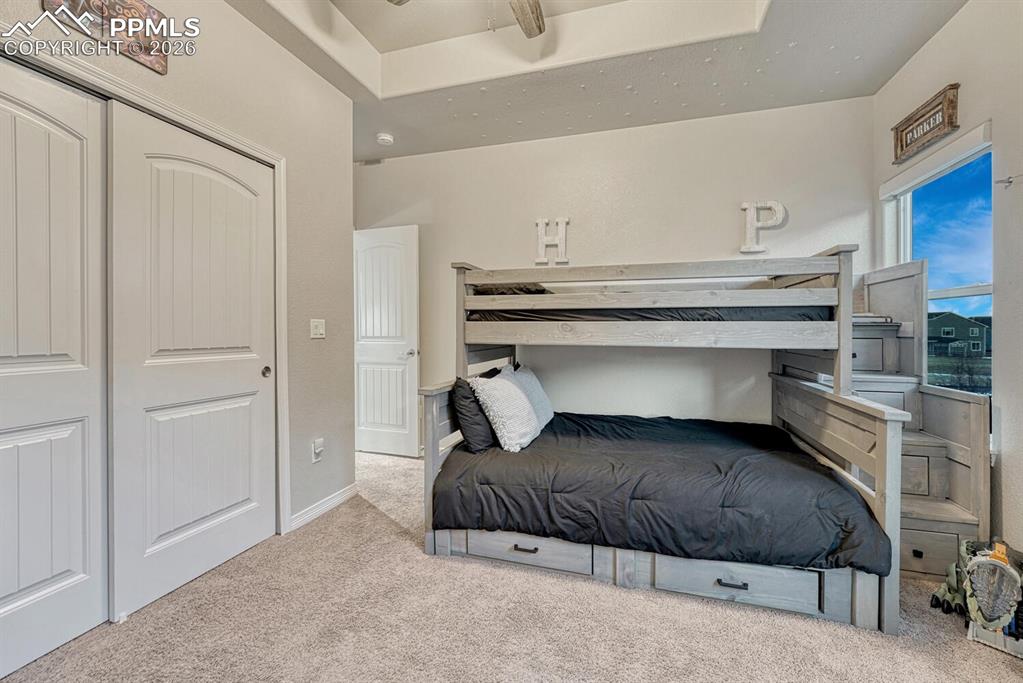 Image 18 of 46: Bedroom featuring carpet floors and a closet