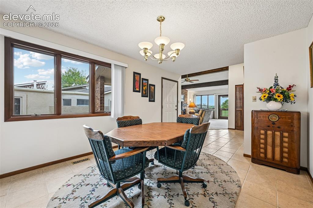 Image 10 of 30: Dedicated dining space with natural light