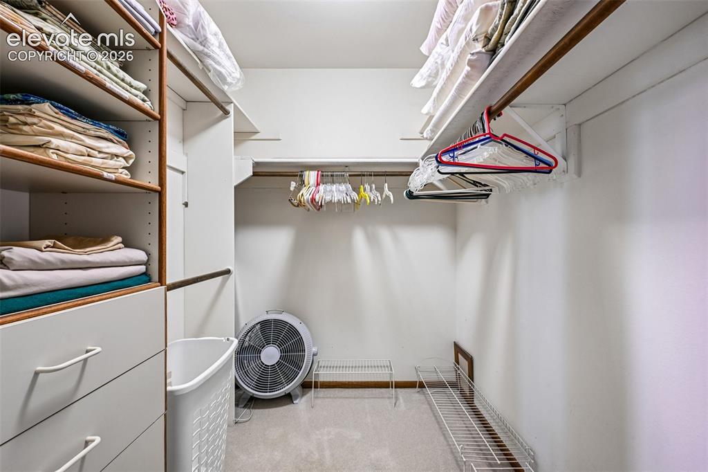 Image 20 of 30: Incredible walk in closet