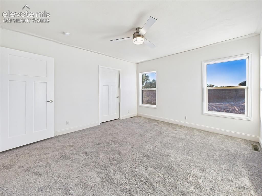 Image 29 of 50: Unstaged layout highlighting walk-in closet entry and access to private bat