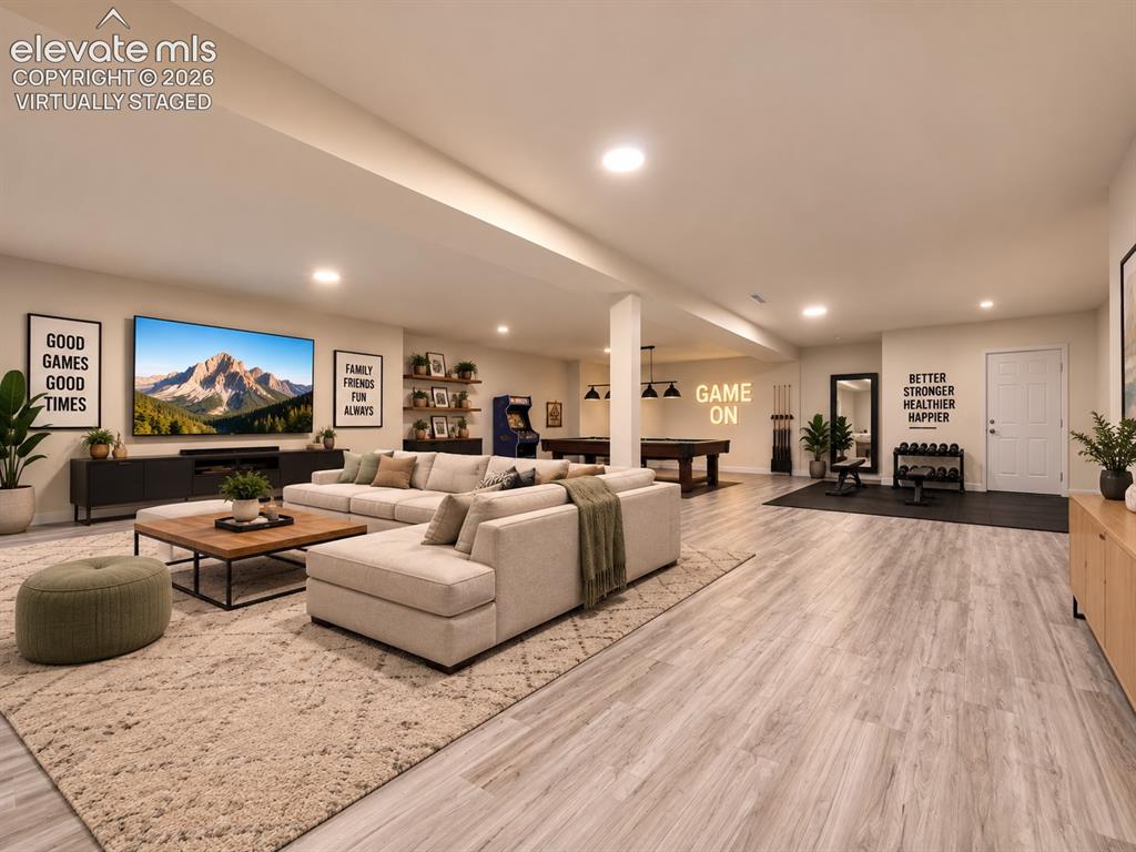 Image 47 of 50: Virtually Staged Basement – Virtually staged to illustrate the basement’s p