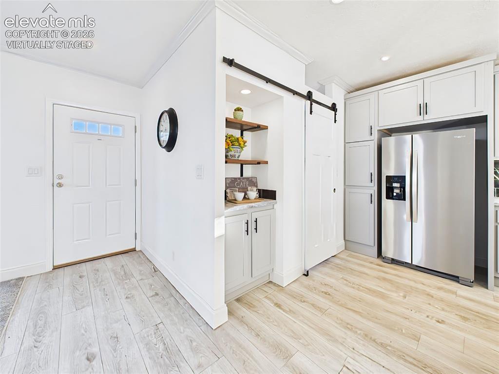 Image 5 of 50: Bright, open living space with large picture windows, natural light—virtual