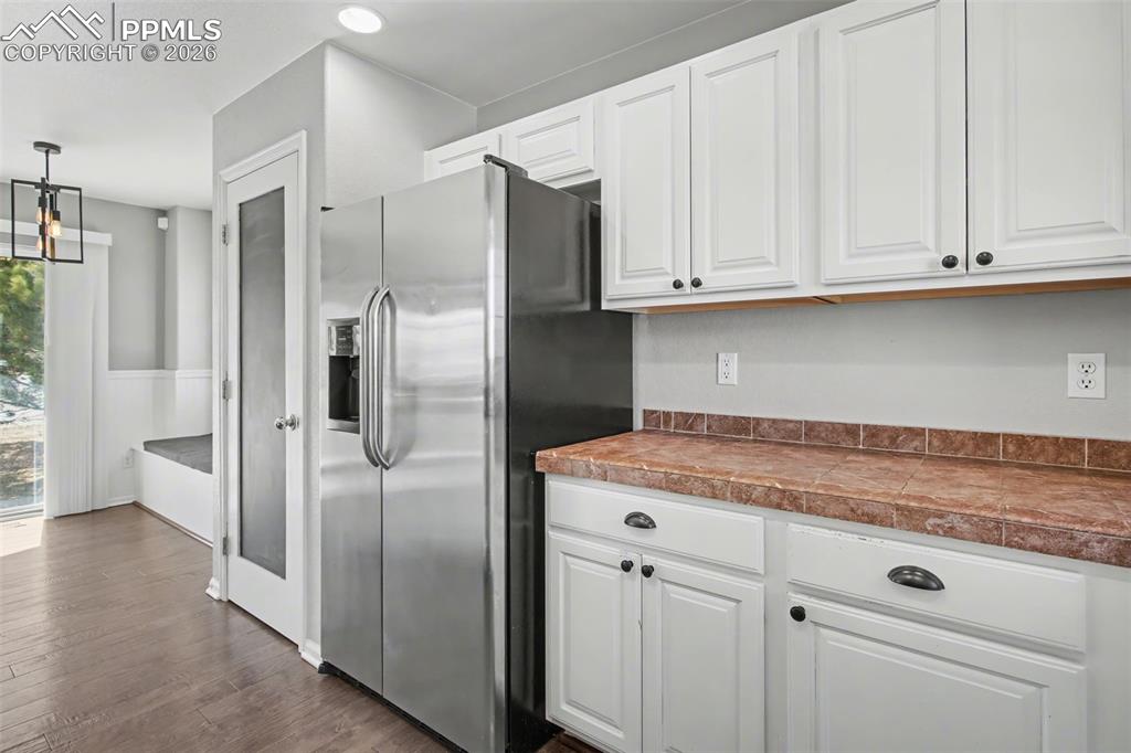 Image 17 of 36: Dining area right by kitchen with walk out to back yard