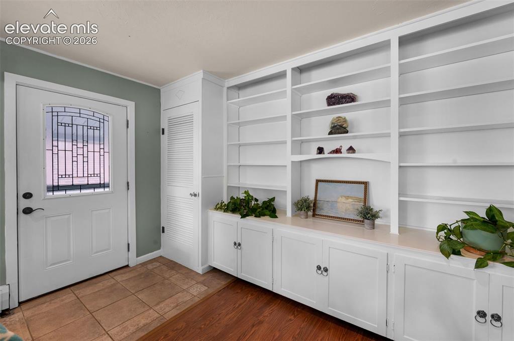 Image 7 of 28: Built-in bookshelves