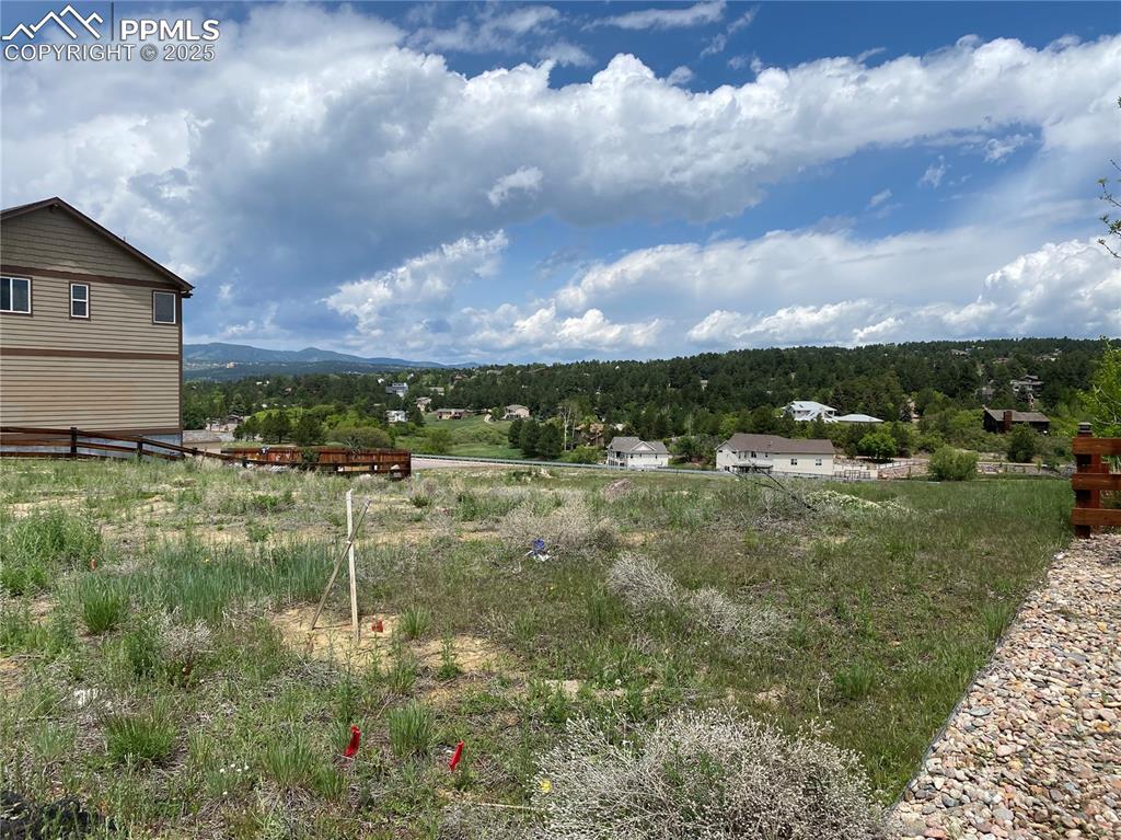 Image 3 of 3: View of yard with a mountain view