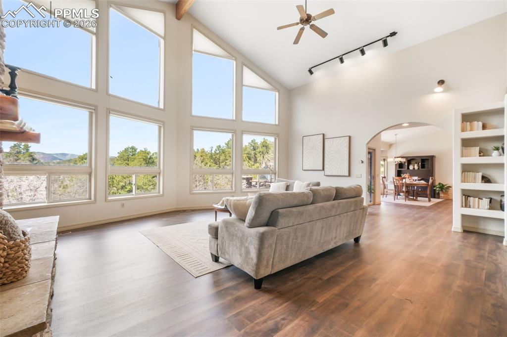 Image 20 of 50: Dual vessel sinks set atop a light-toned countertop with integrated backspl