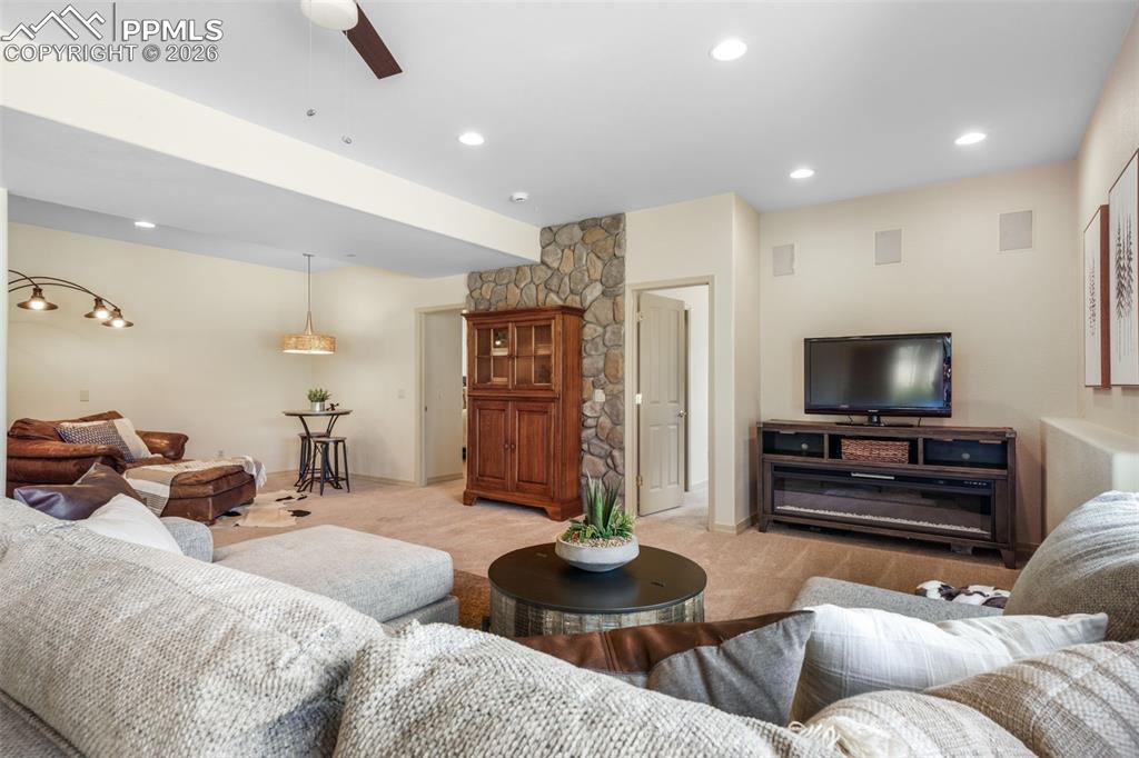 Image 33 of 50: Kitchen featuring wood-finish flooring, light wood cabinetry with dark crow