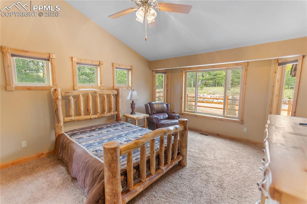 Image 15 of 40: Main level master suite