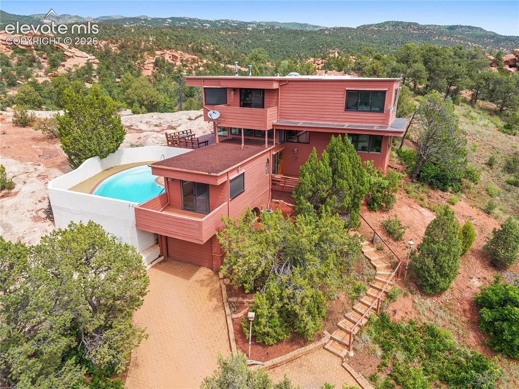 Image 1 of 47: Custom-built home perched on a vista in an extraordinary setting!