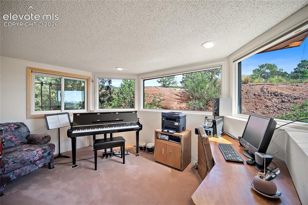 Image 29 of 47: Upstairs flex space. Perfect for an office, reading room, exercise space, e