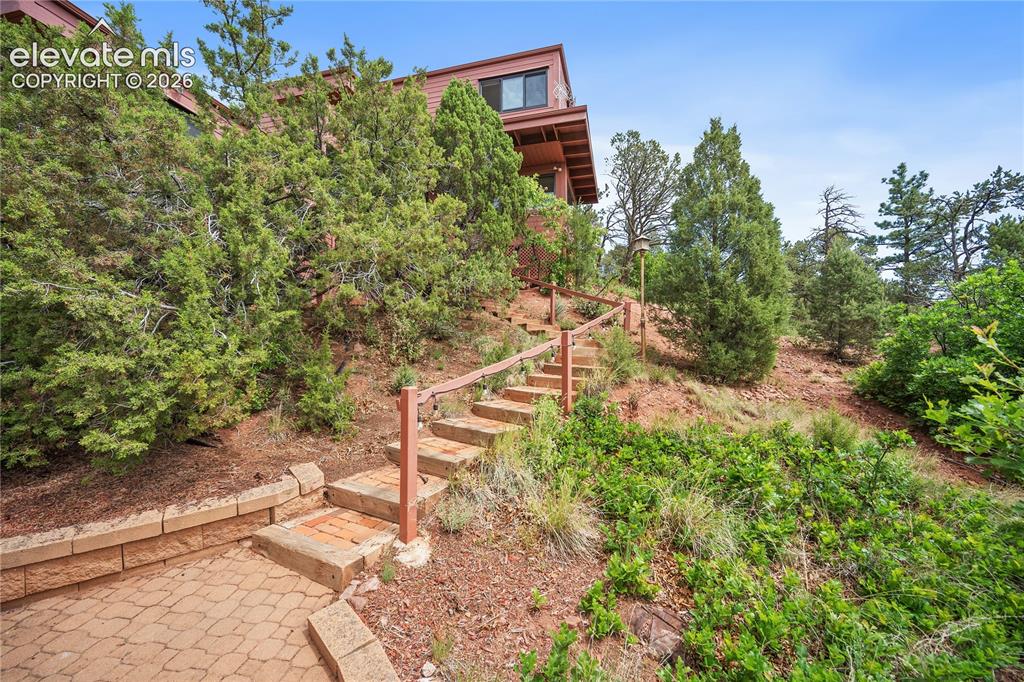 Image 5 of 47: Stairs leading up to the front entrance.