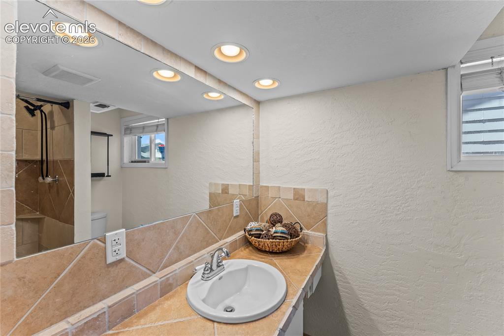 Image 21 of 30: Basement Bathroom