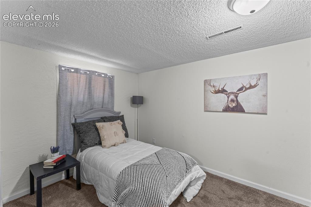 Image 22 of 30: Basement Bedroom #4