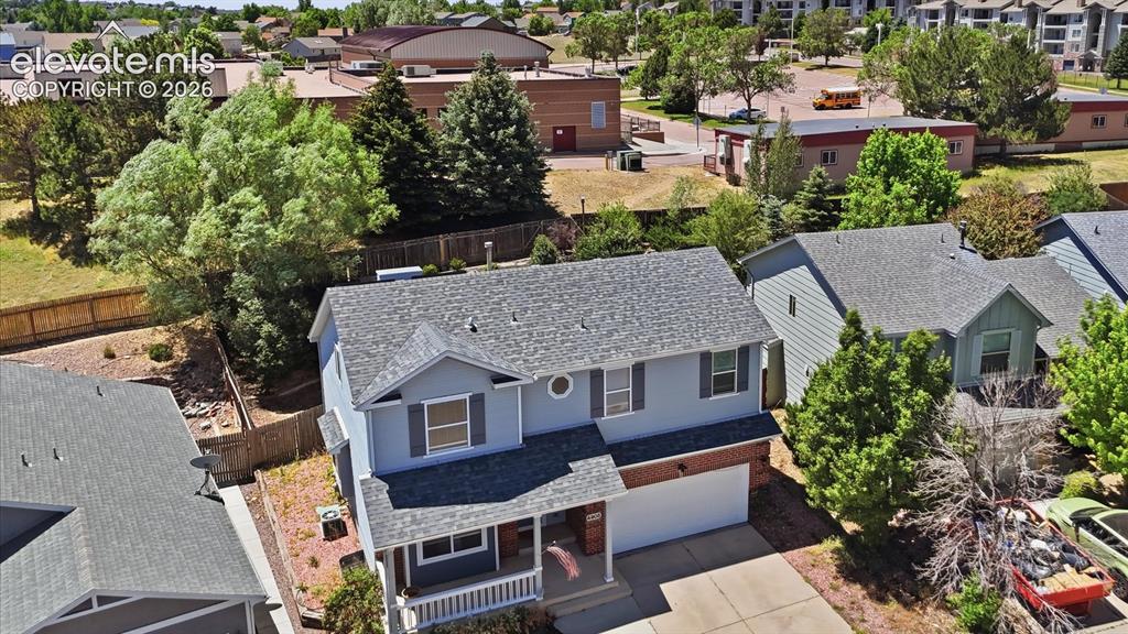 Image 2 of 50: Aerial front view of home.