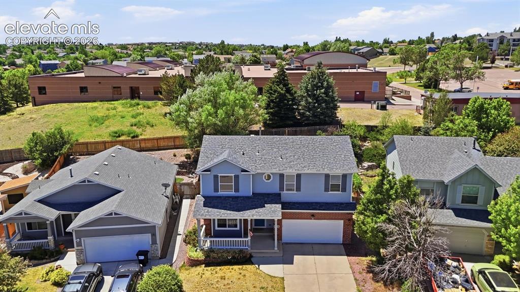 Image 3 of 50: Aerial view of home and neighborhood.