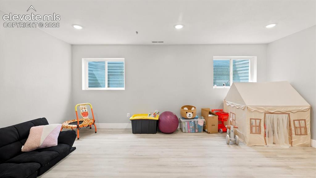 Image 36 of 50: Basement Family Room.