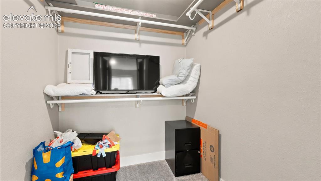 Image 40 of 50: Walk in closet in Basement Bedroom #4.