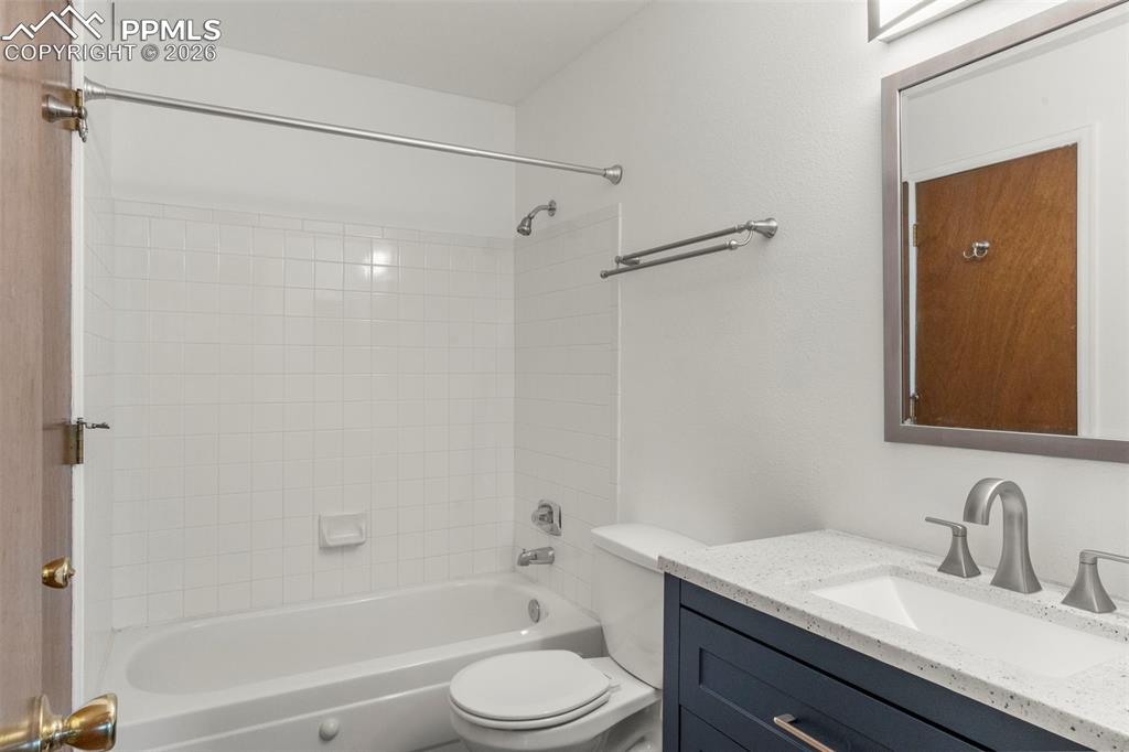 Image 46 of 50: Full bathroom featuring vanity and shower / bathtub combination