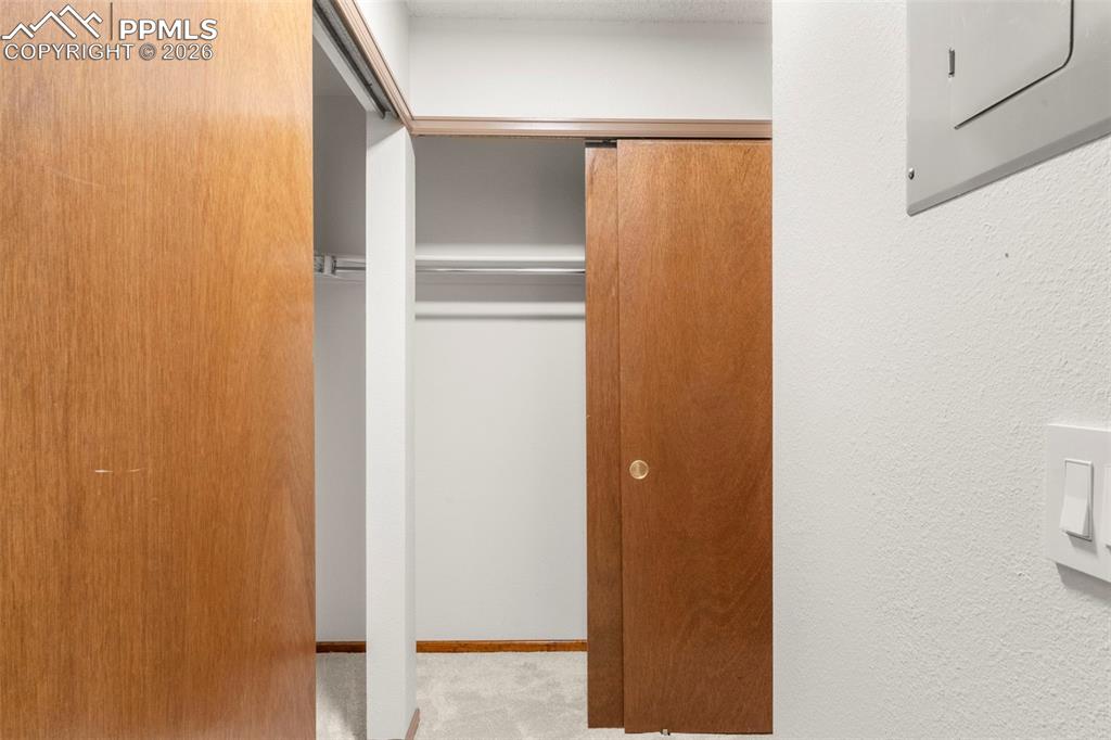 Image 47 of 50: Closet featuring electric panel