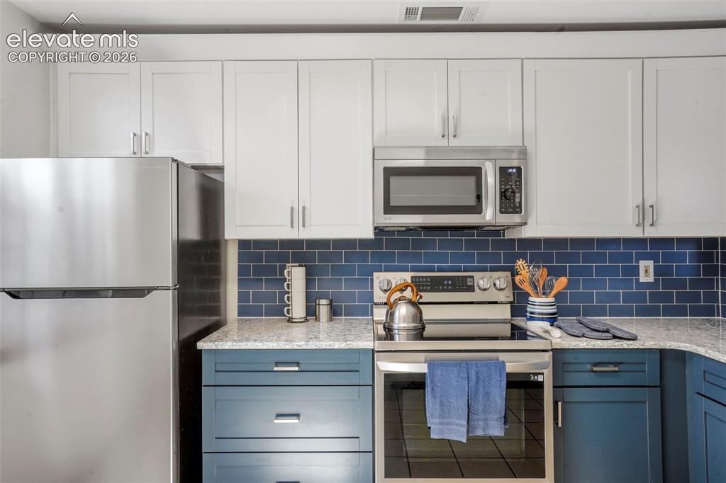 Image 8 of 50: DEEP KITCHEN SINK, BEAUTIFUL BACKSPLASH
