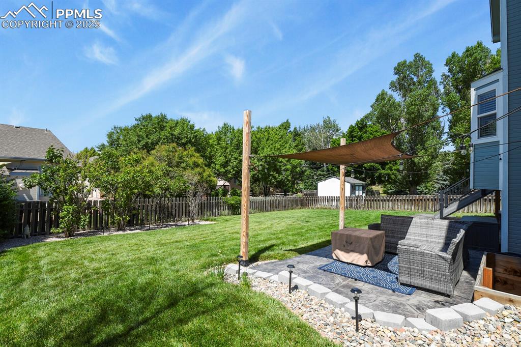 Image 46 of 50: View of fenced backyard
