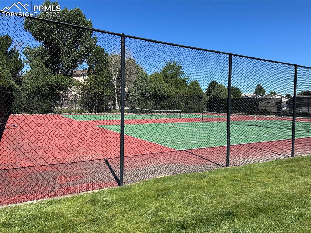 Image 49 of 50: View of tennis court