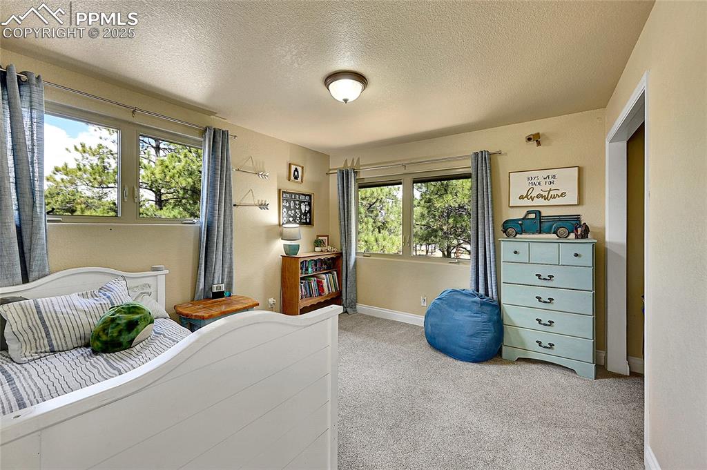 Image 23 of 50: Upstairs Bedroom 