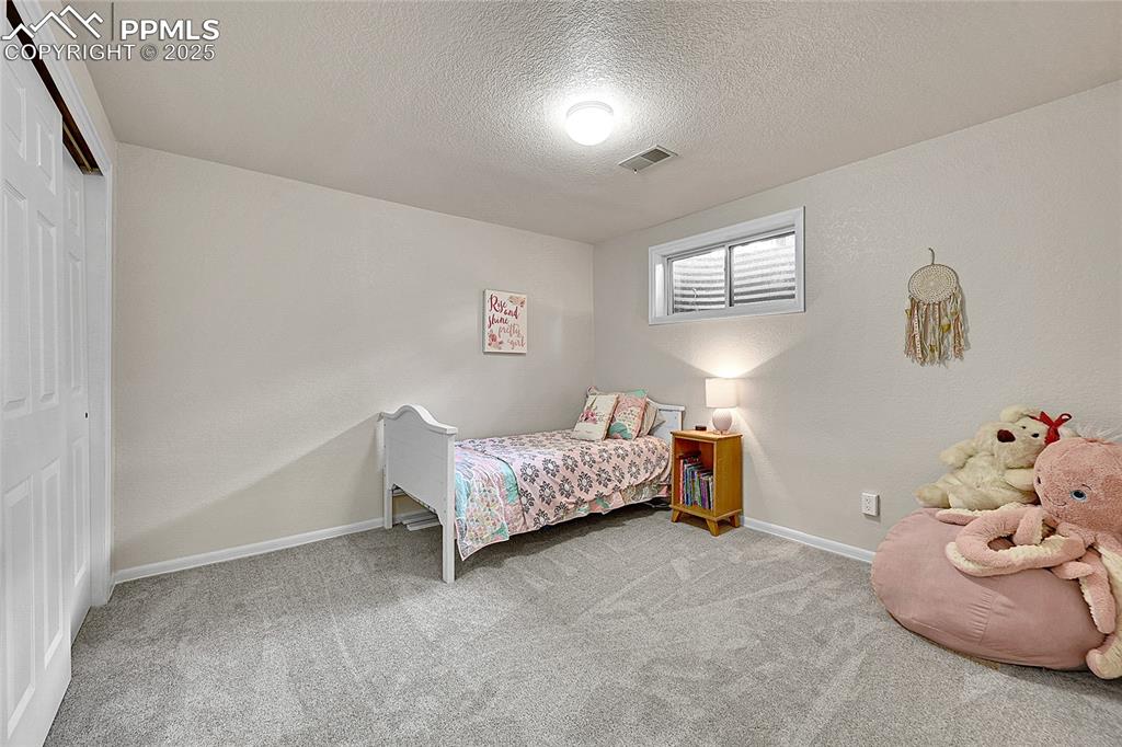 Image 31 of 50: 2nd bedroom in basement 