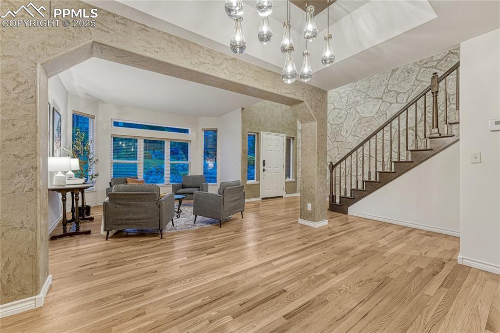 Image 10 of 28: This area shows a combined great room area flowing into the dining room are