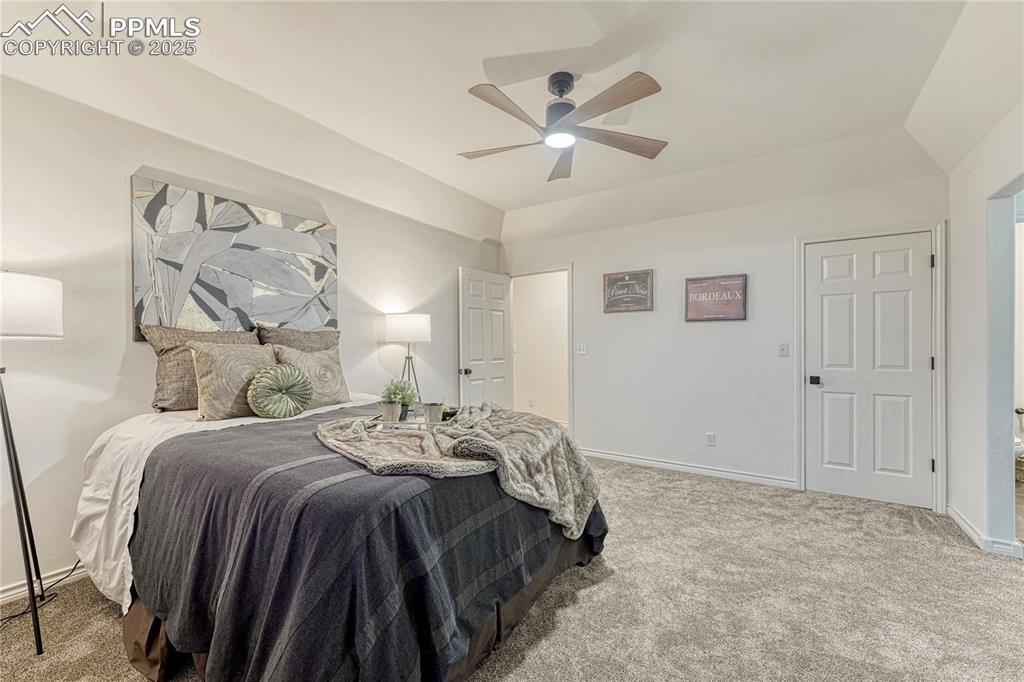 Image 13 of 28: The views from this main floor primary bedroom & bathroom ever night- with 