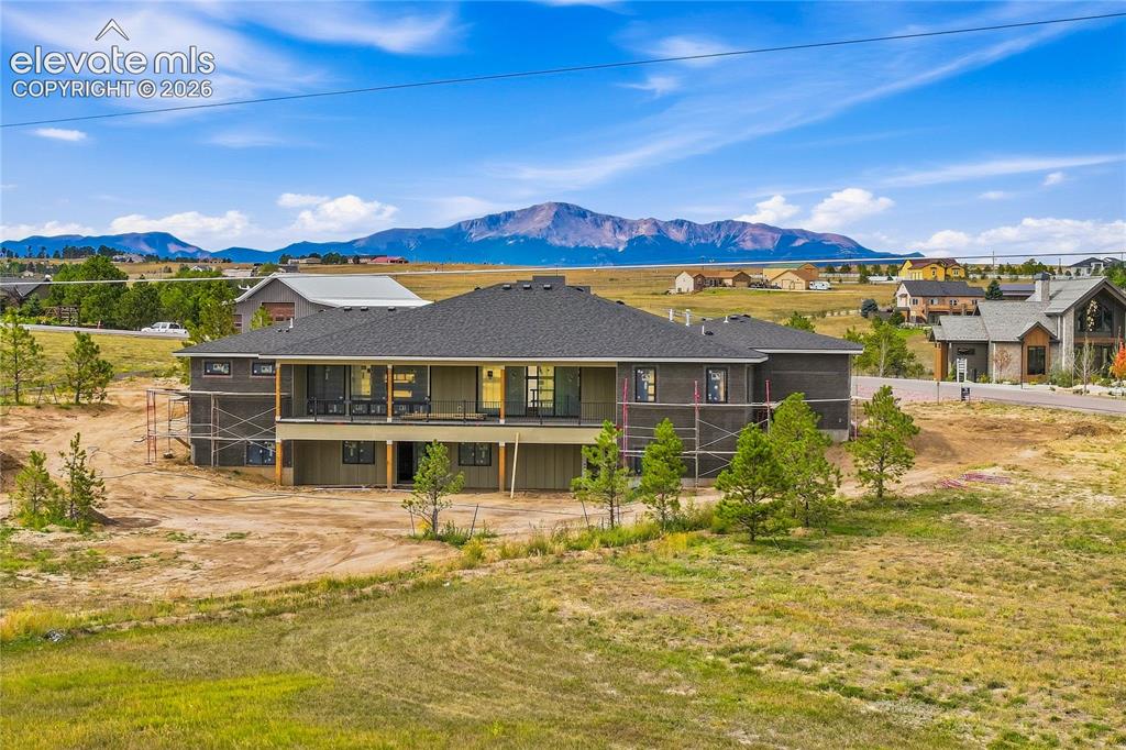 Image 2 of 13: Back of home looking Southwest