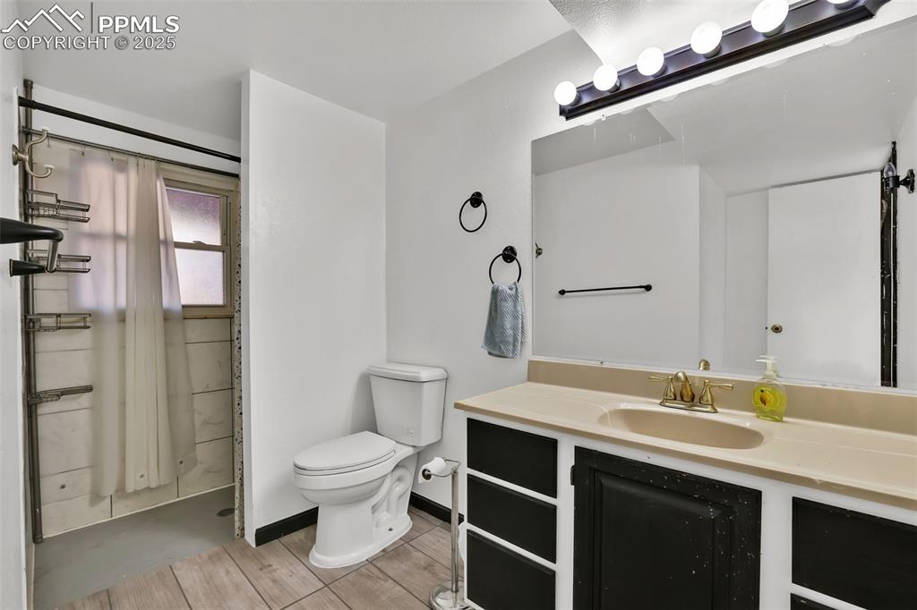 Image 12 of 15: Lower Level Bathroom