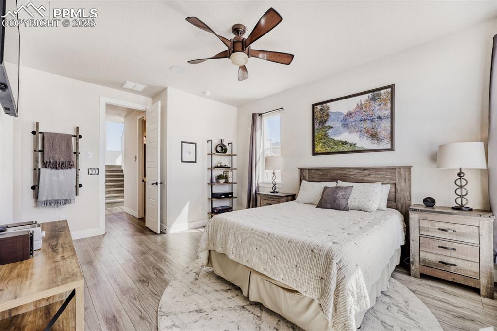 Image 15 of 45: Primary Suite Bathed in Sunlight