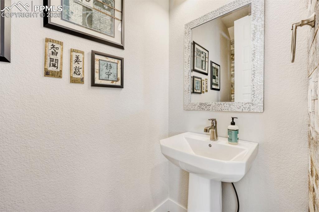 Image 18 of 45: Delightful Modern Powder Room