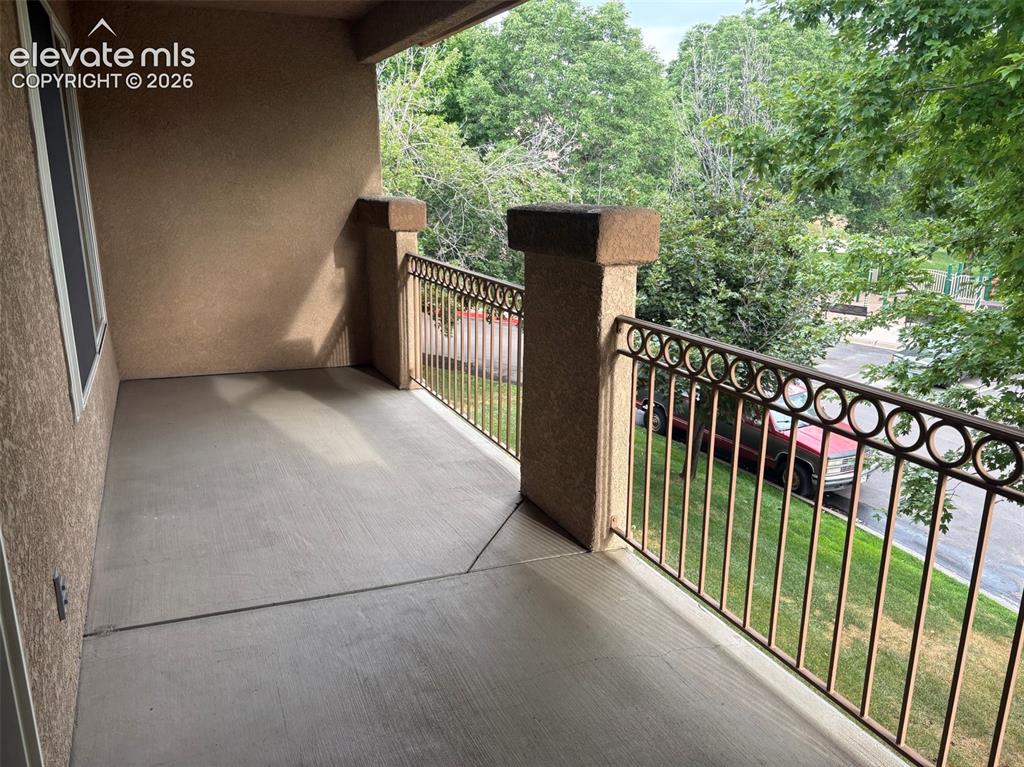 Image 7 of 15: Patio off the upper level