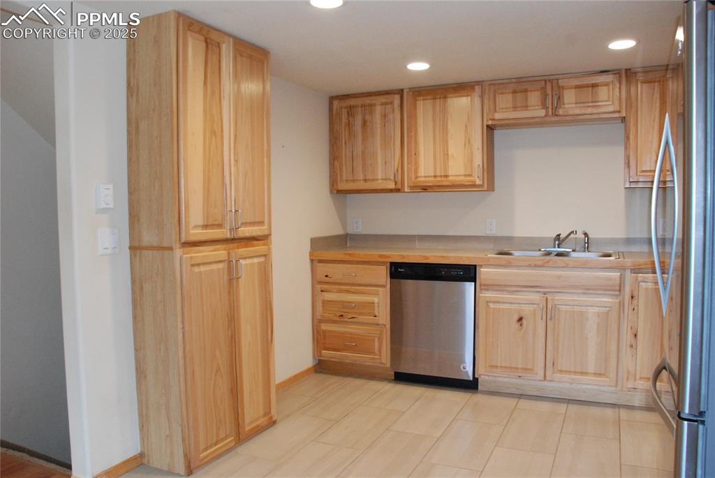 Image 14 of 37: Completing the Kitchen is a nice-sized pantry.