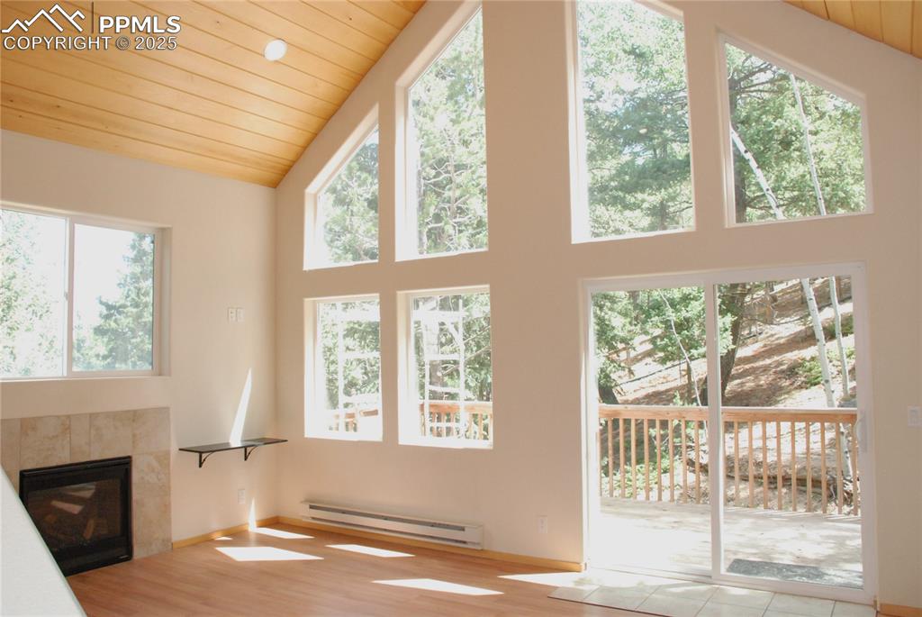 Image 7 of 37: Warm up to the cozy gas fireplace on cold winter nights.