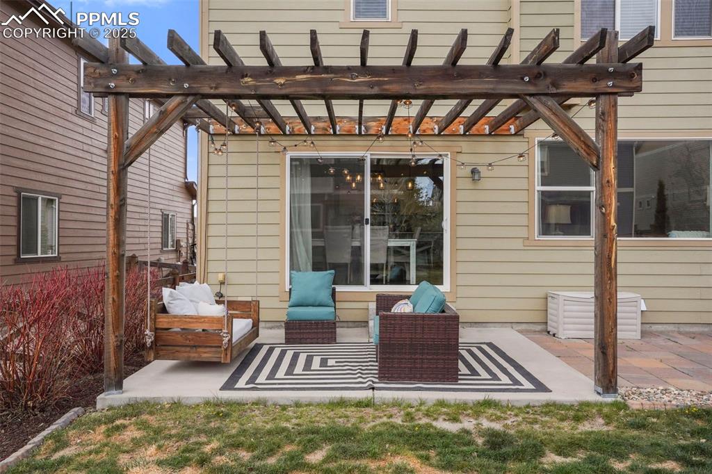 Image 30 of 36: View of patio featuring fence and a pergola