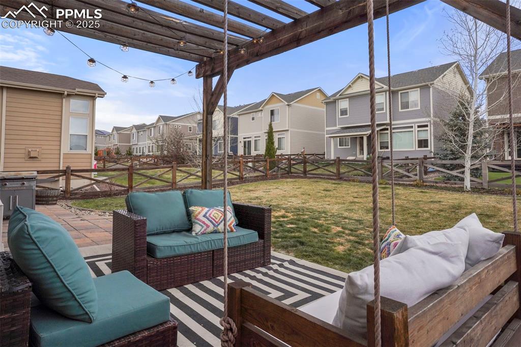 Image 31 of 36: View of patio / terrace featuring a pergola, a fenced backyard, and outdoor