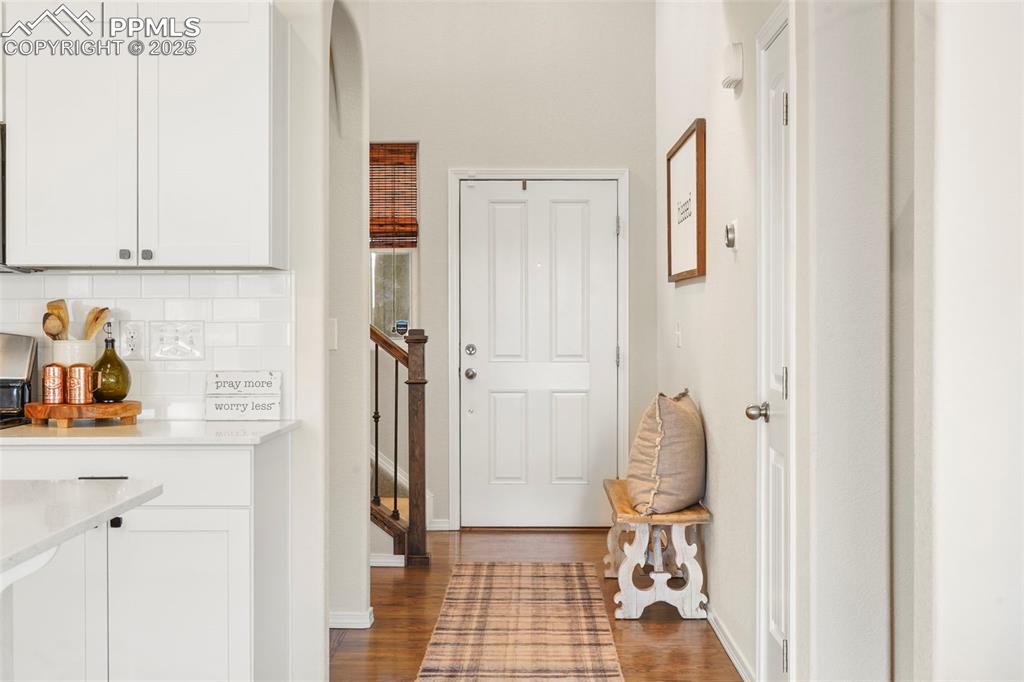 Image 5 of 36: Entry way with vaulted ceiling