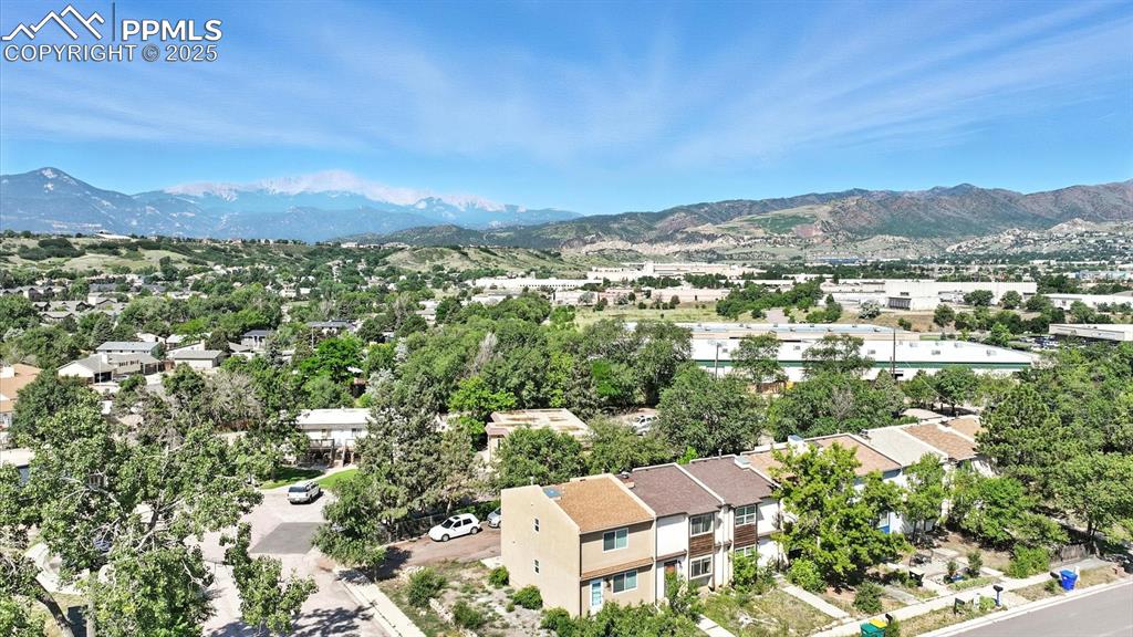 Image 3 of 50: Aerial view of home, lot, and Peak views.