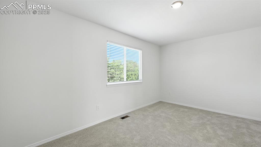 Image 30 of 50: Upper Level Bedroom #2.